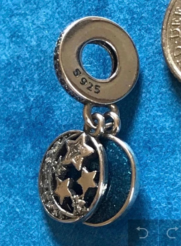 High Quality Moon and back Charm Hallmarked S925 Sterling Silver comes in a cute velvet pouch FREE Postage fast dispatch Fits: Popular European Charm Bracelets Stars and moon