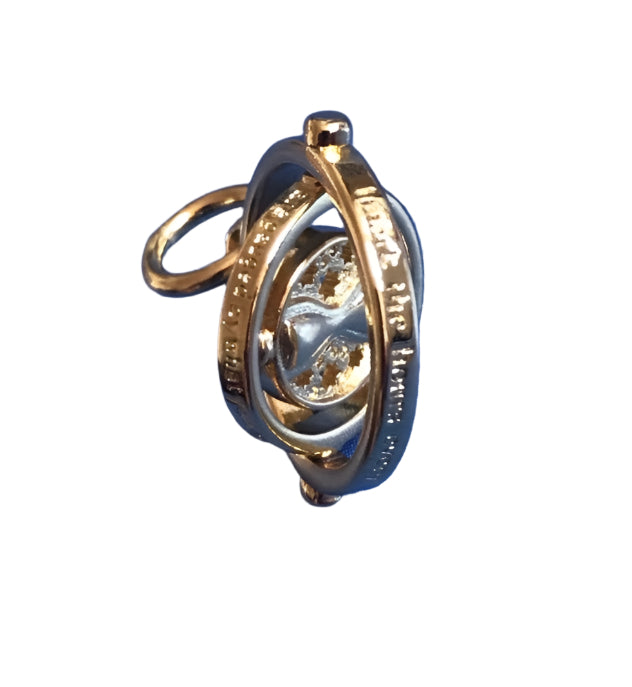 Genuine 925 Silver Time Turner charm on a white background