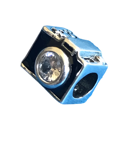 Silver Camera Photographer charm with a clear gemstone on a white background