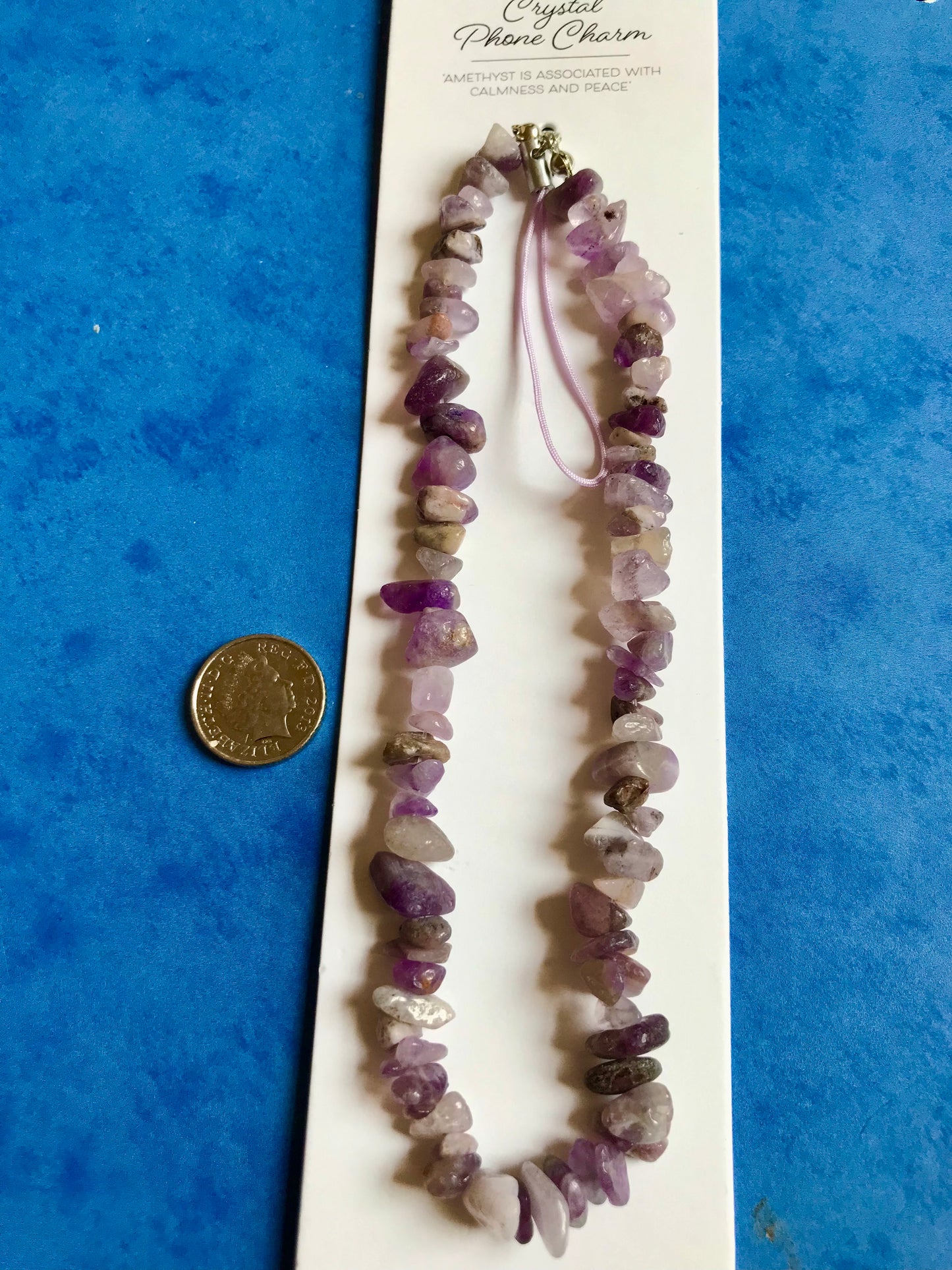 Crystal phone charm with amethyst stones
