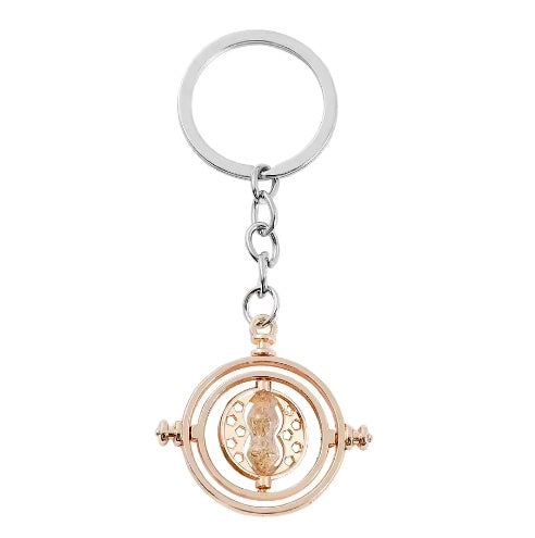 Harry Potter Time Turner Keyring gold colour with a circular design and metallic finish on a white background