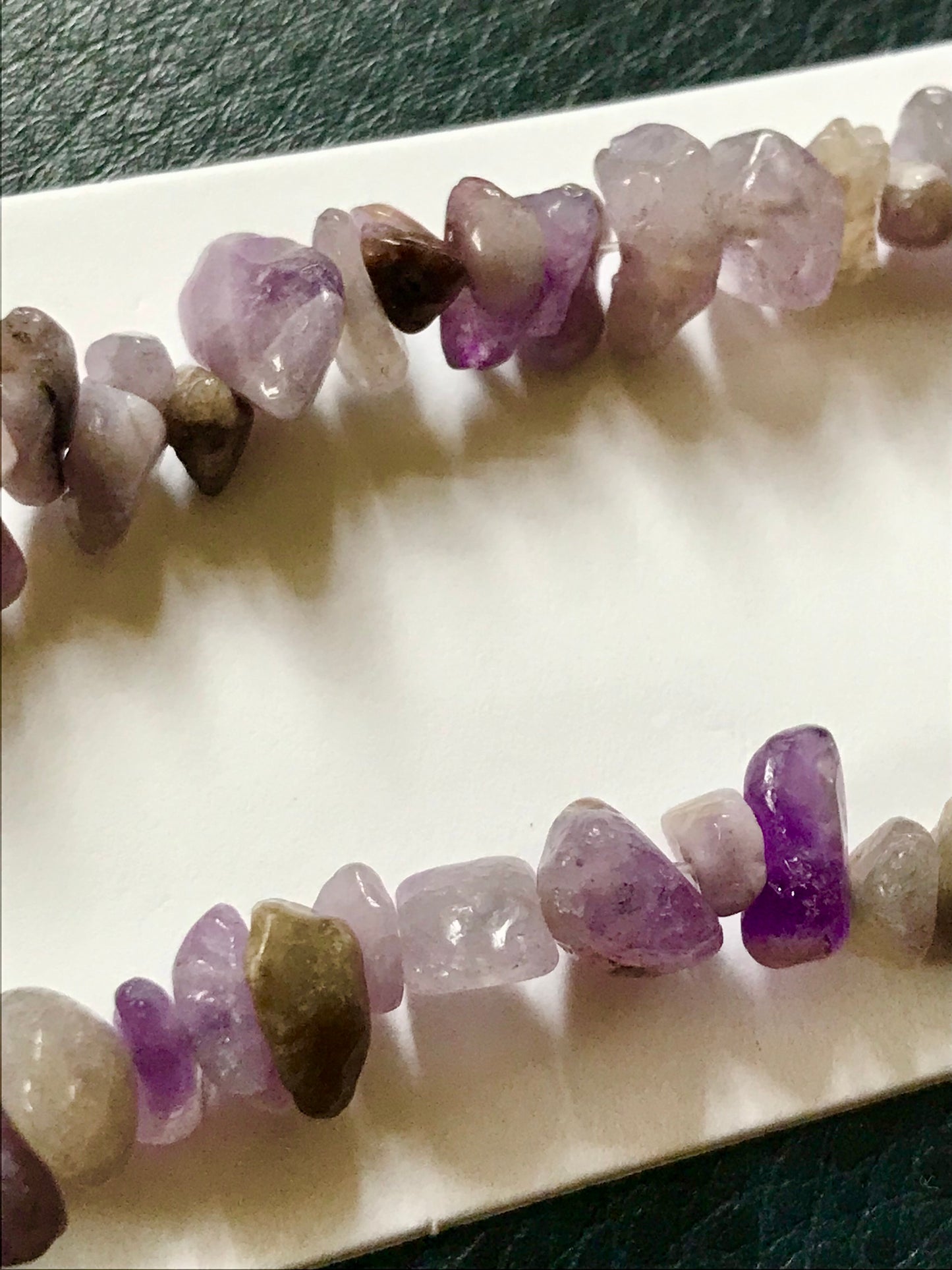Crystal phone charm with amethyst stones