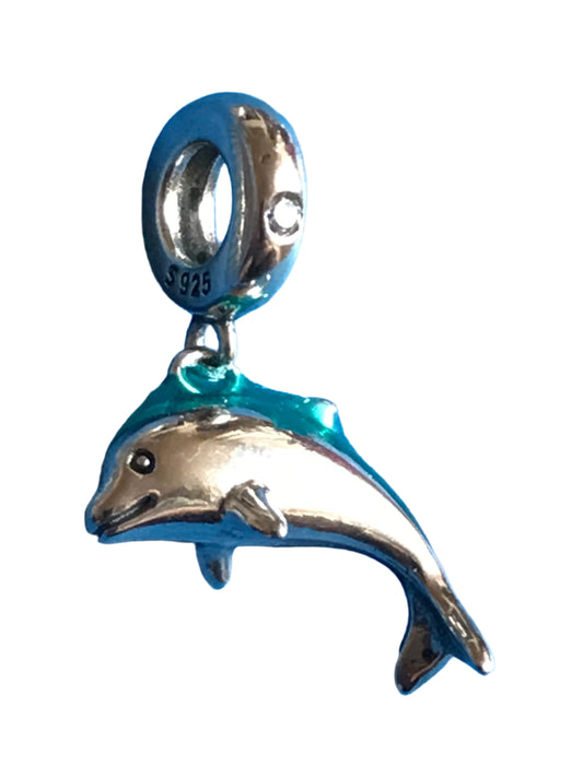 Silver and blue dolphin charm on a white background