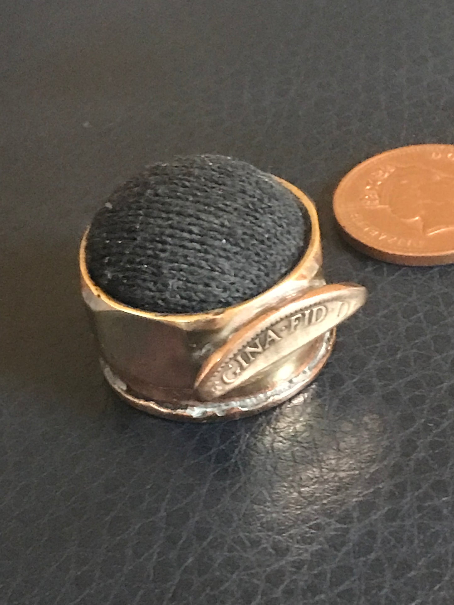 Trench Art WW2 mini pink cushion made from brass wheel nut