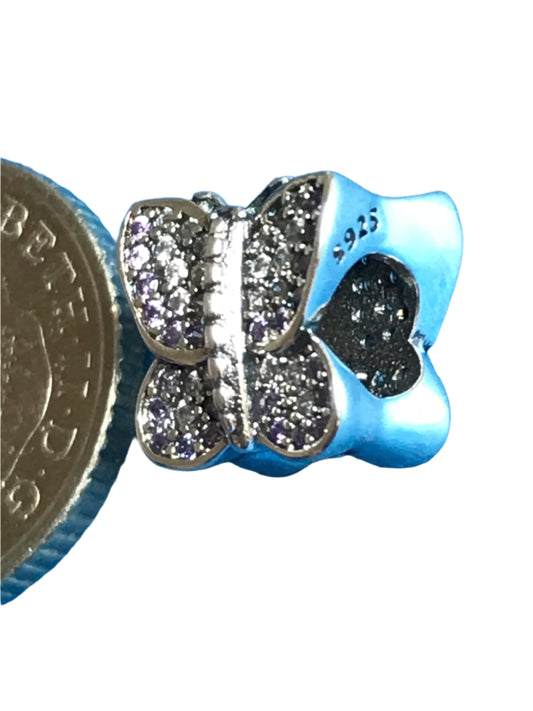Butterfly-shaped charm with heart detail on a white background for charm bracelet 925 silver