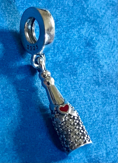 Silver Champagne bottle charm with a red heart on a blue background for charm bracelet 