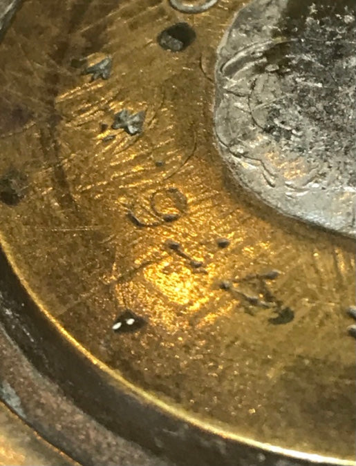 Close-up view of a brass World War Two Trench Art Vase 