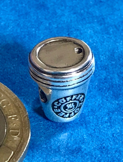 Silver Coffee Cup charm on a blue background for charm bracelet 