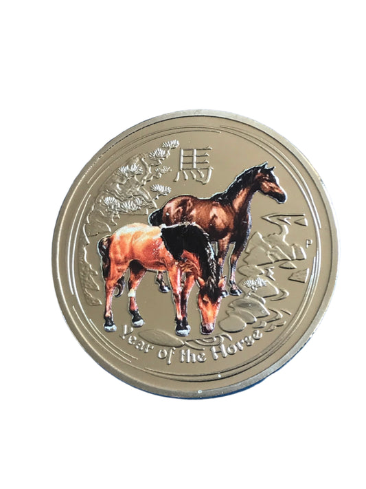 Coin with horse design on a white background