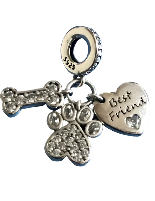 Silver charm with paw prints, a bone, and 'Best Friend' heart on a white background for charm bracelet 