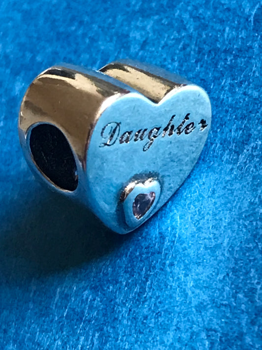 Silver charm with 'Daughter' engraved on a blue textured background for charm bracelet 