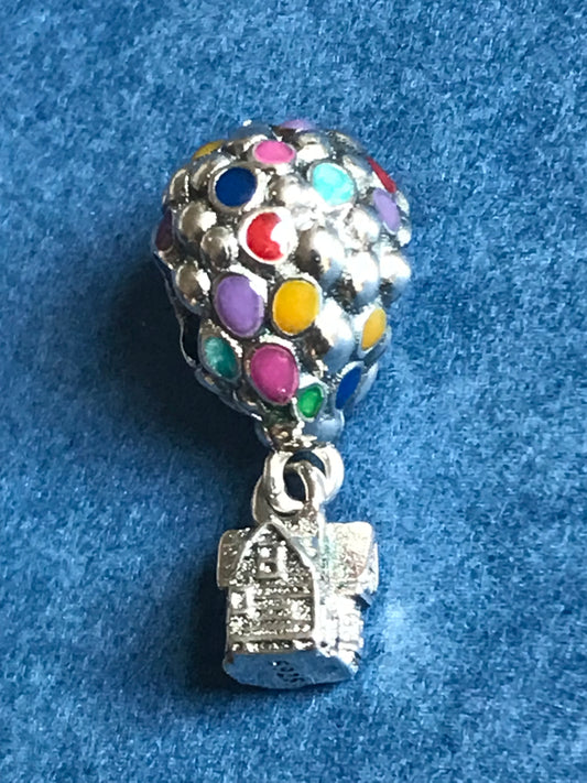 Genuine 925 Silver UP The Movie charm on a blue fabric background fit Pandora 