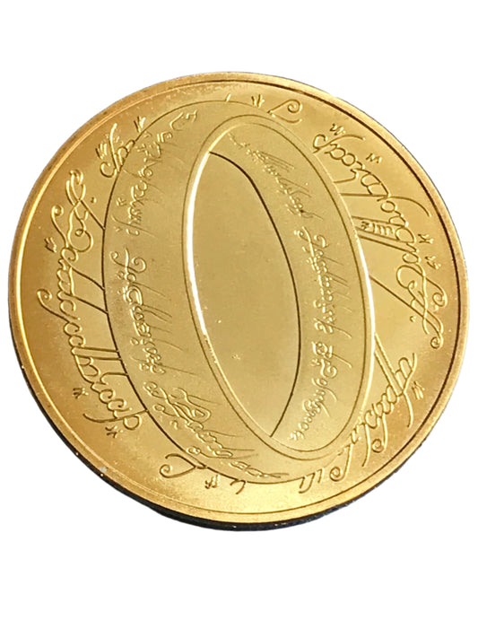 New Lord of the Rings gold coin with Elvish script on a blue background
