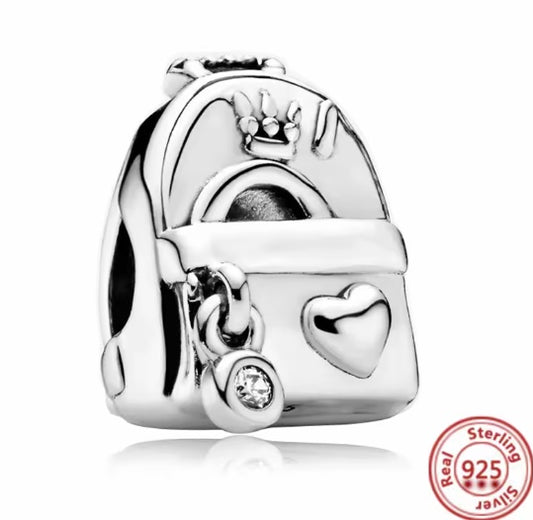 Silver charm with heart design and crown on a white background for charm bracelet 925 silver